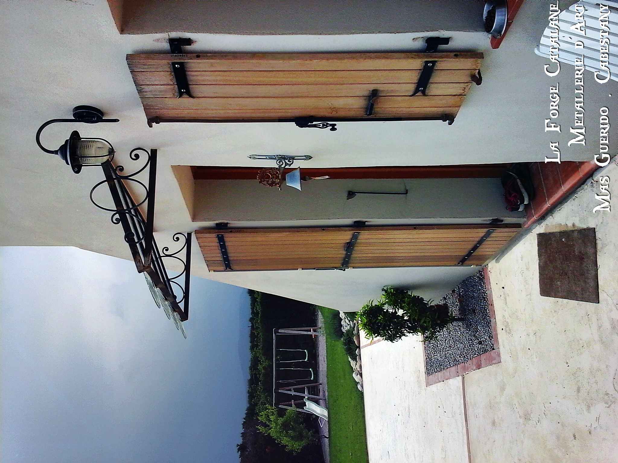 marquise type vitrage fil de fer arme motifs lateraux Forge  Catalane.jpg